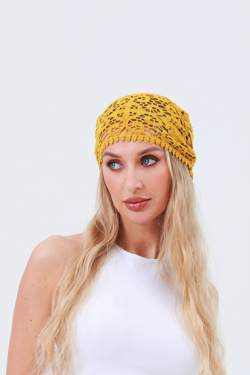 Trestles Clothing Company mustard yellow cotton crochet bandana worn by a blonde woman for a boho 70s style look